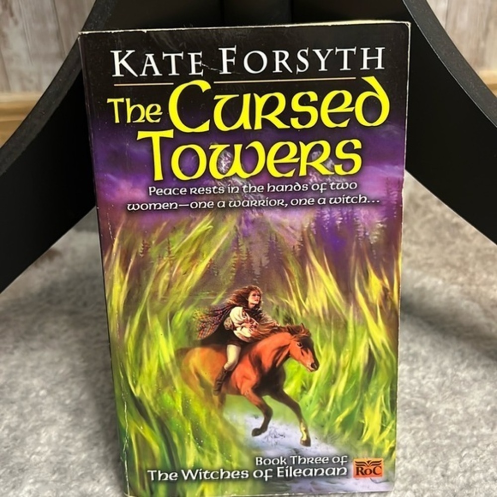 The Cursed Towers Paperback Book